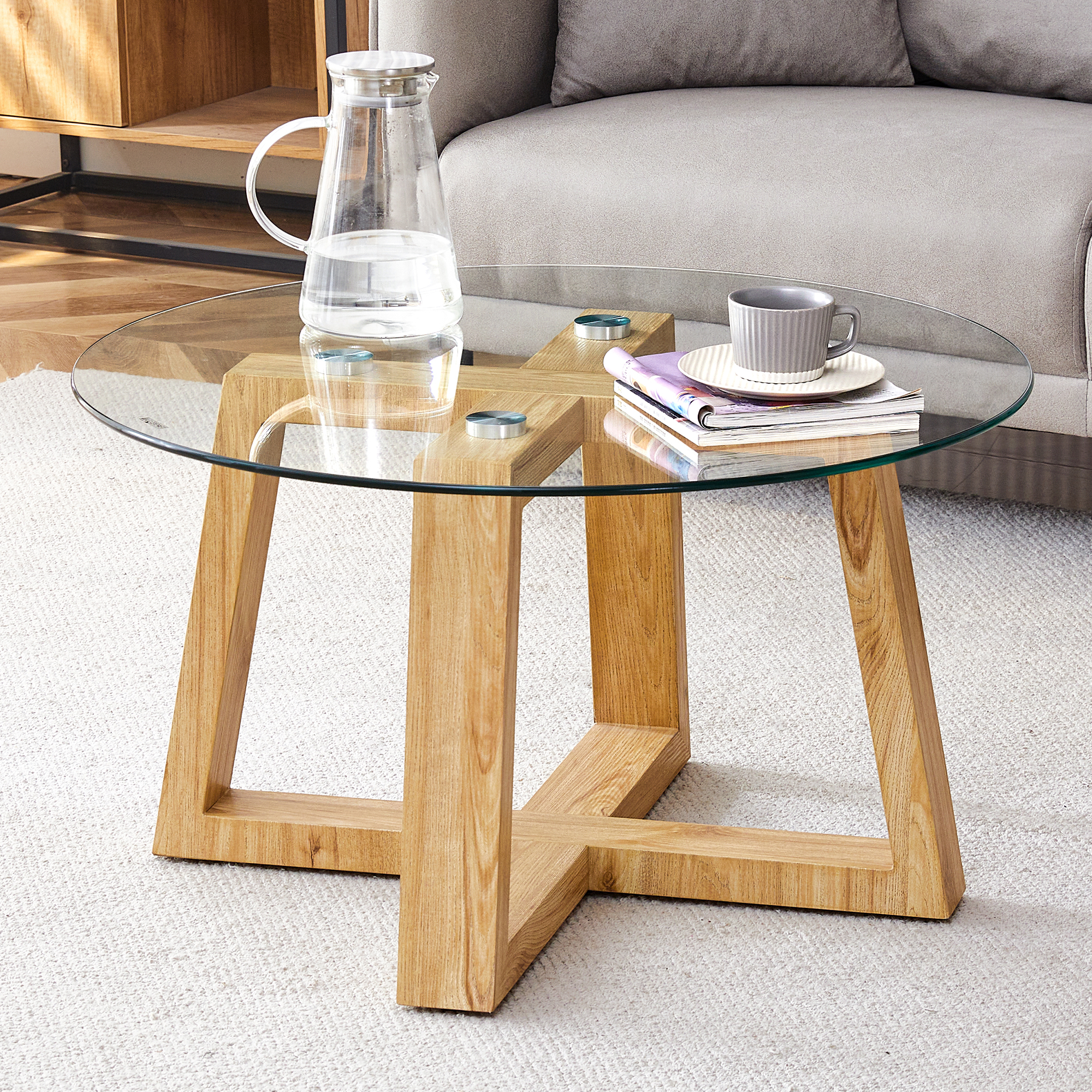 Modern practical circular coffee tables. Made of transparent tempered glass tabletop and wood colored MDF material. Suitable for living rooms and bedrooms.31.5"*31.5"*17.7"